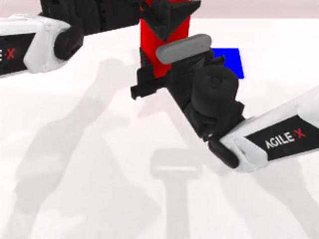 Phase 5: carrying the block toward the target pad.